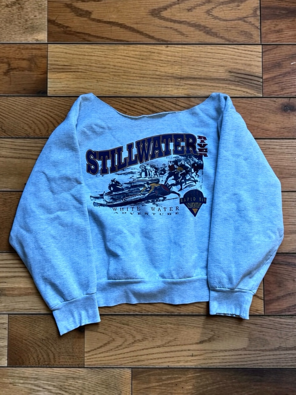 Coleman Light Blue Crewneck Sweatshirt with Stillwater Graphic